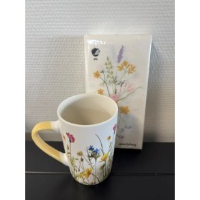 Krus med blomster og gul hank samt servietter fra Speedtsberg - Tinashjem