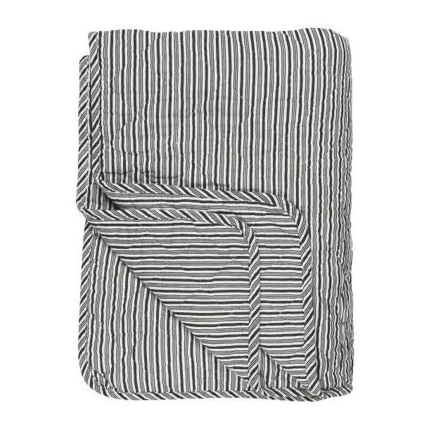 Quilt med hvide og sorte striber fra Ib Laursen - Tinashjem