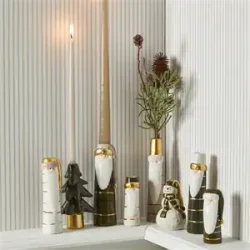 Lysestage snemand til kertelys fra Speedtsberg p� hylde med andre lysestager - Tinashjem