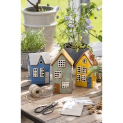 Hus til fyrfadslys Nyhavn hus med bl� d�r fra Ib Laursen i vindue med andre lyshuse - Tinashjem