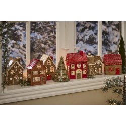 Hus til fyrfadslys Stillenat Gingerbread med firkantet d�r fra Ib Laursen med andre lyshuse i vindue - Tinashjem