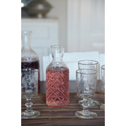 Jeanne d�Arc Living karaffel p� bord ved glas - Tinashjem